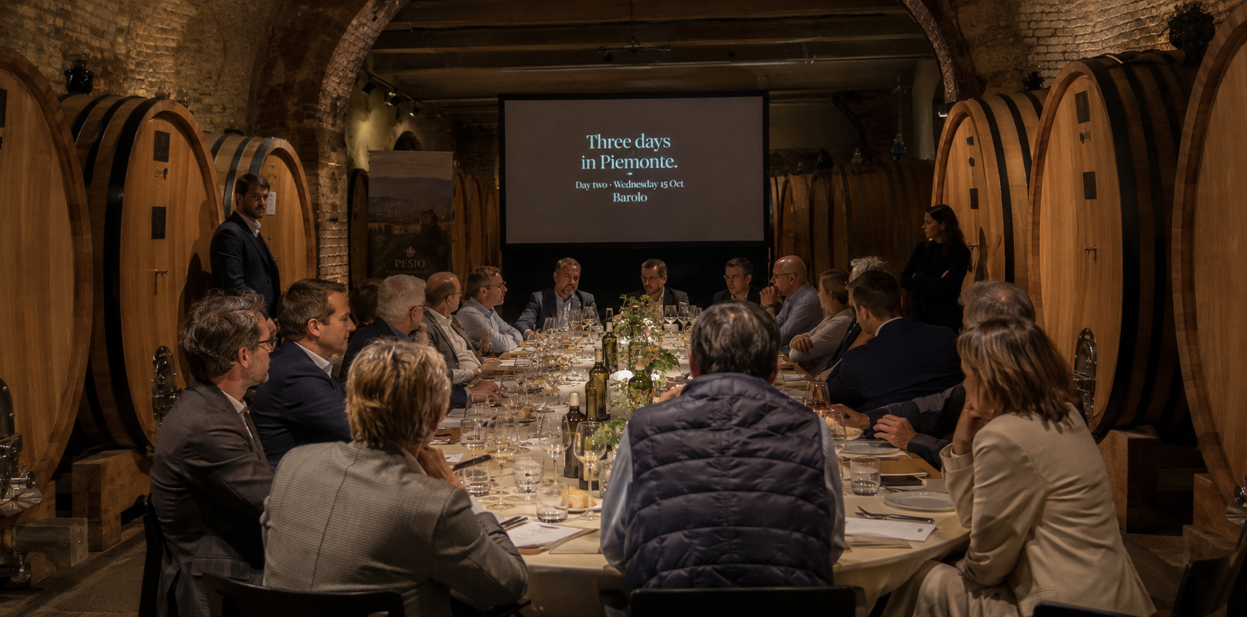 Candlelit cellar dinner under vaulted brick arches in Barolo, Piemonte